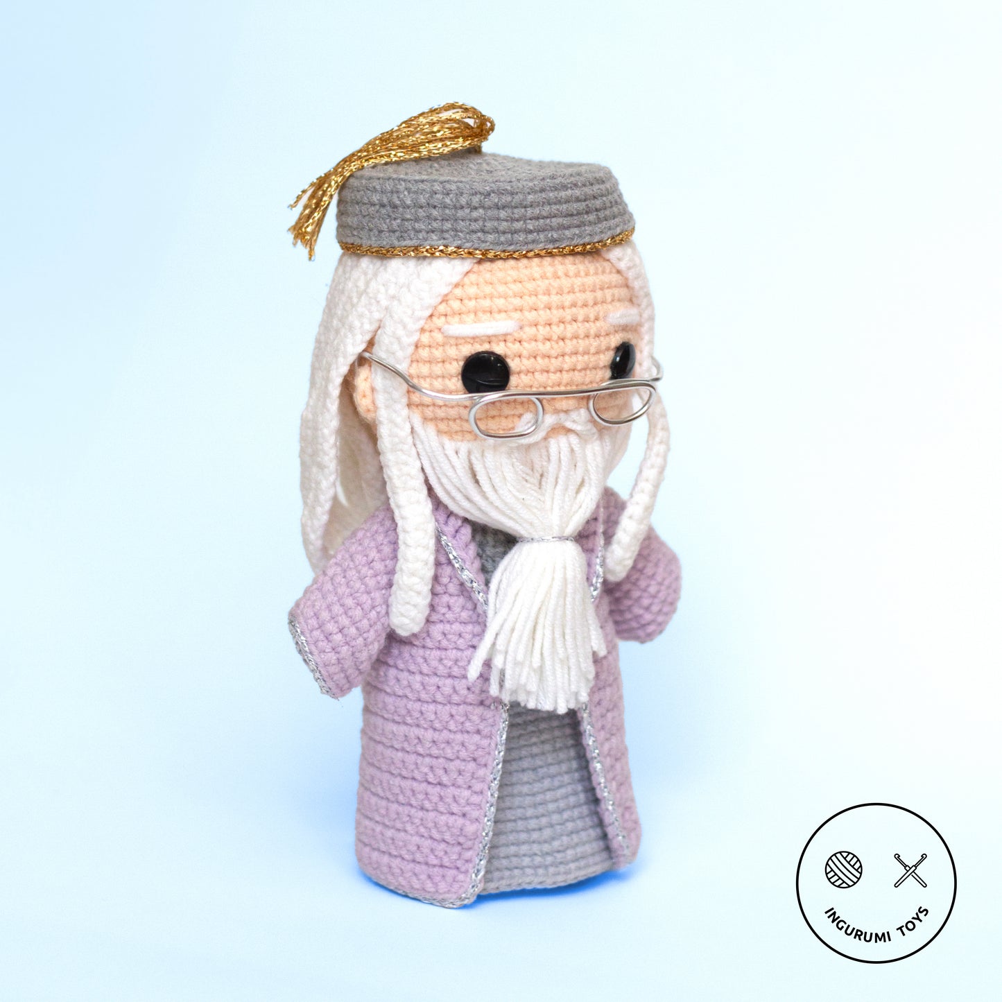 Amigurumi crochet pattern – Dumbledore toy with a lilac cloak and iconic half-moon shaped glasses