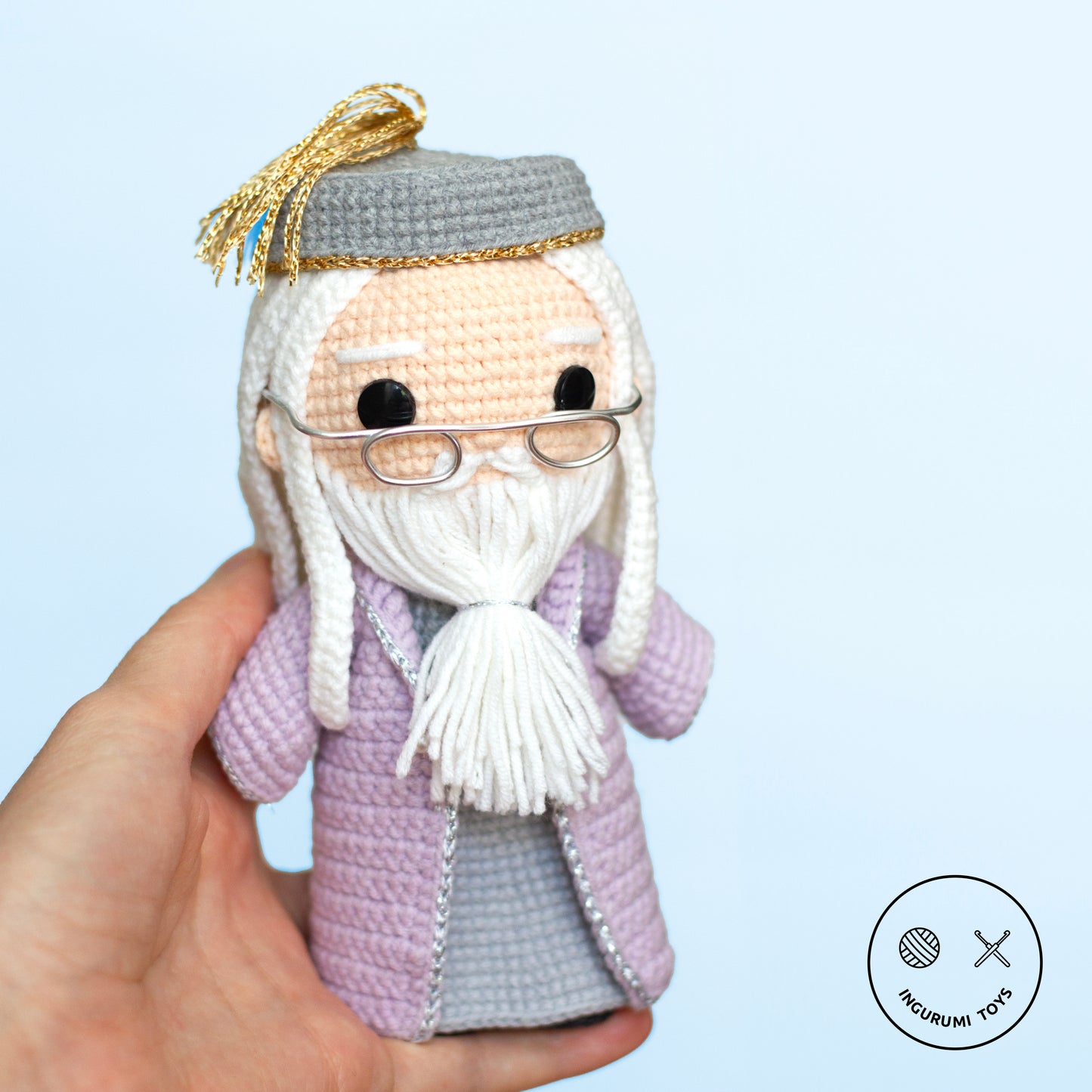 Amigurumi crochet pattern – Dumbledore toy with a lilac cloak and iconic half-moon shaped glasses