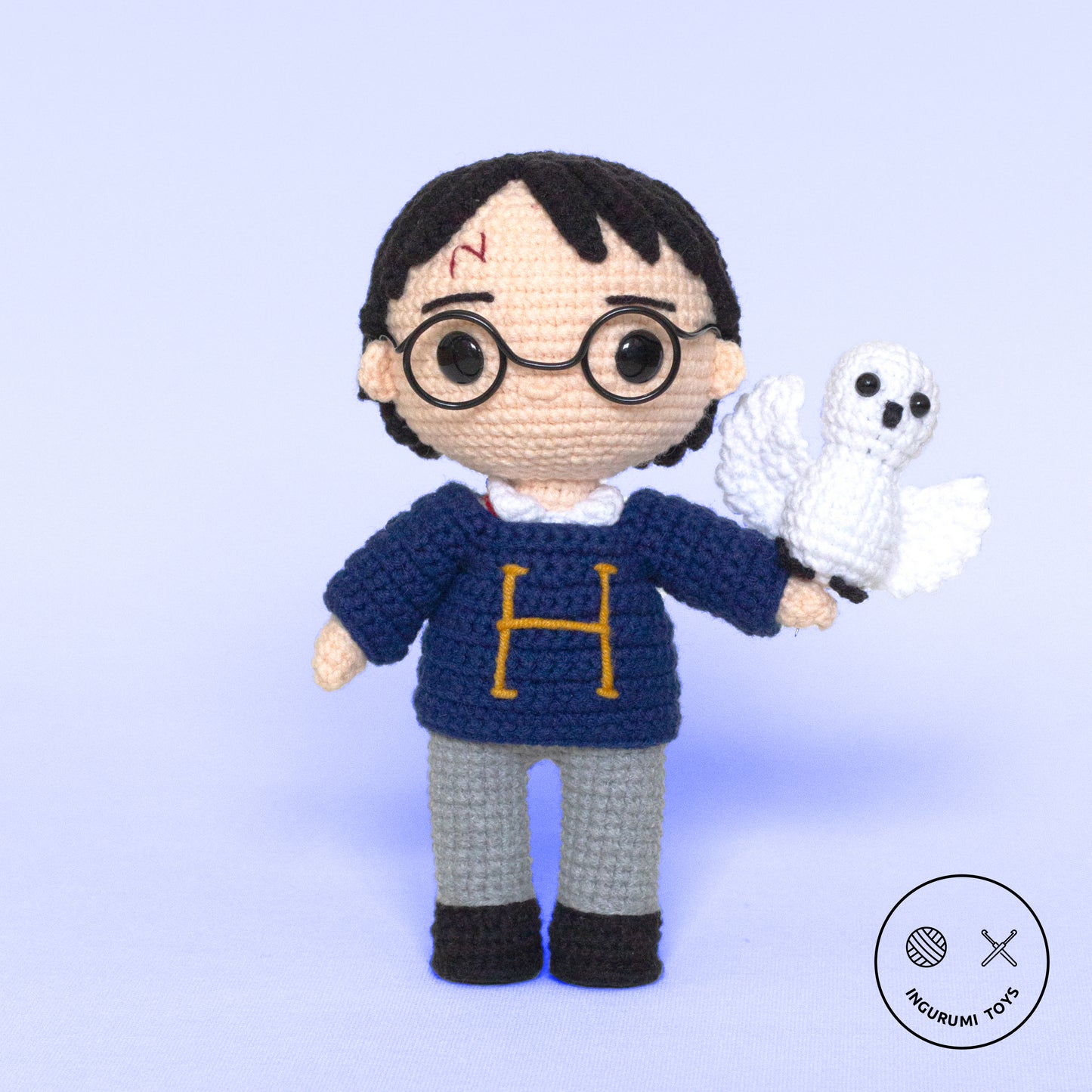 Harry Potter amigurumi crochet pattern – doll in H letter blue sweater with crocheted Hedwig owl