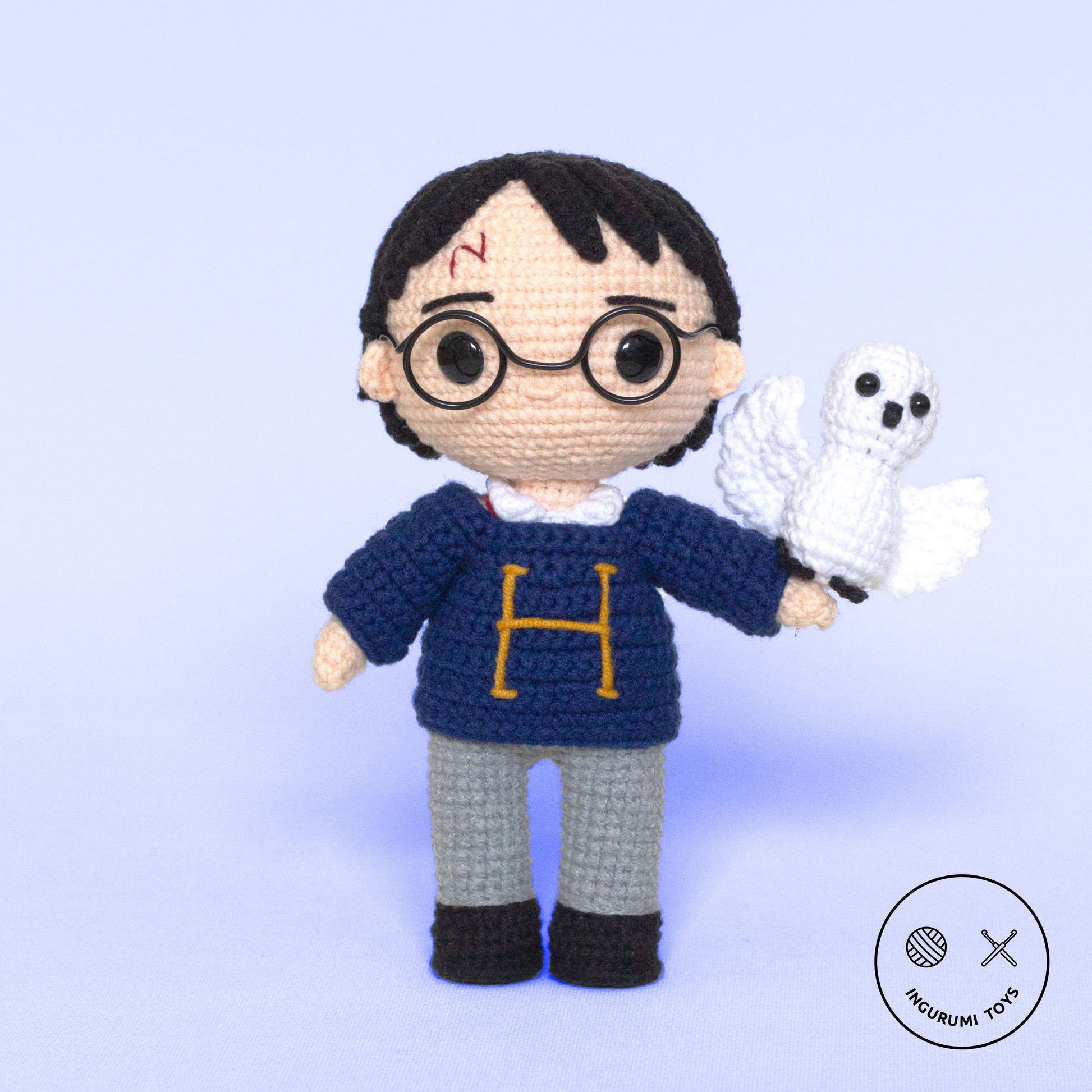 Harry Potter amigurumi crochet pattern – doll in H letter blue sweater with crocheted Hedwig owl